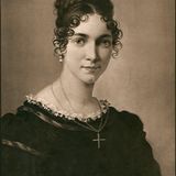 Selbstbildnis in schwarzweiss , Frauenkopf mit hochgesteckten Haaren und Kreuz um den Hals