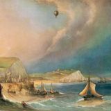 Ein Ballon schwebt hoch über dem Ärmelkanal, auf dem ein Schiff fährt