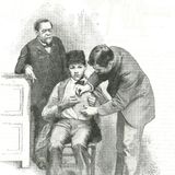 Joseph Meister, auf einem Stuhl sitzend, wird untersucht