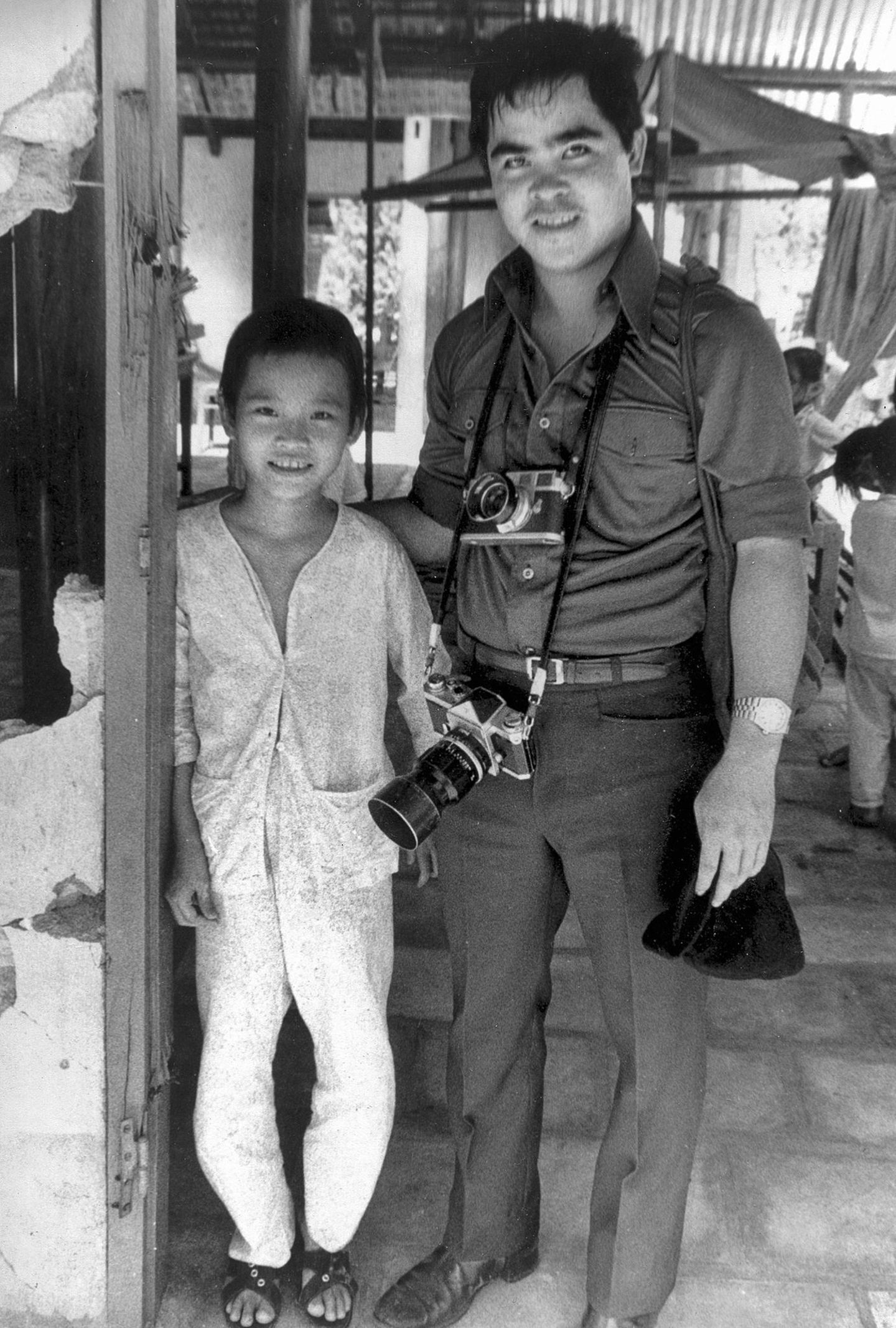 Phan Thi Kim Phuc mit dem Fotografen Nick Ut