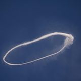 Wirbel über dem Ätna am Himmel