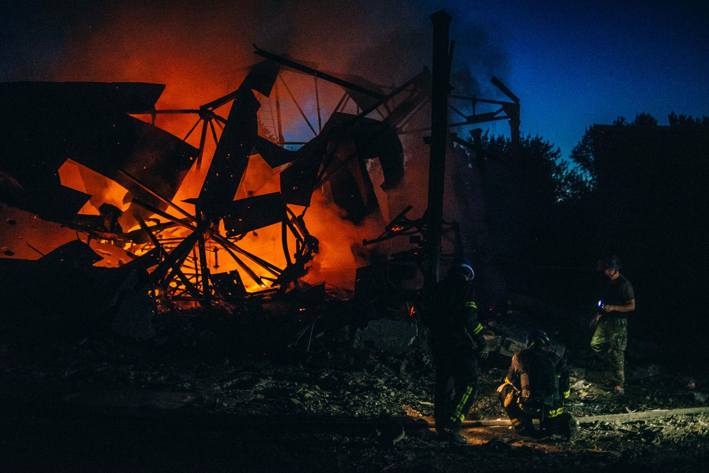 Sieger der Kategorie offenes Format: "War is Personal" Feuerwehrleute löschen einen Brand