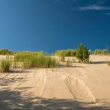 Düne mit blauem Himmel