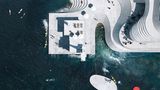 Computergeneriertes Bild, man sieht die moderne Betonstruktur, sieht aus wie Wellen im Meer