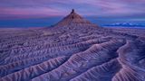 Schon drei Mal hat Xiaoying Shi den Gipfel Factory Butte in Utah besucht. In dem schwachen, warmen Licht kommen dessen einzigartige geologische Formationen besonders gut zur Geltung. 