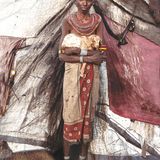 Ältere farbige Frau hält Ziege auf dem Arm