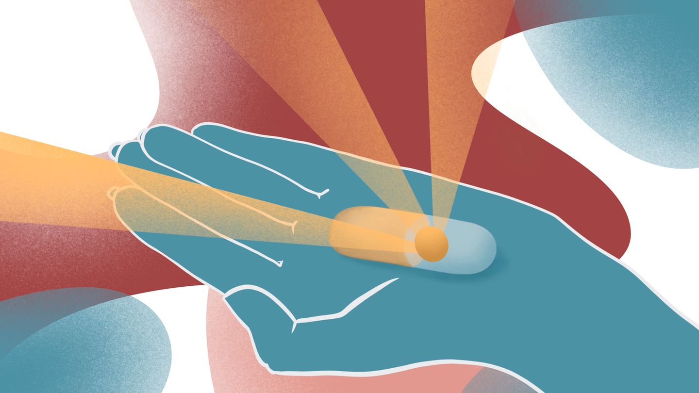 Illustration: Eine Pille auf einer Handfläche
