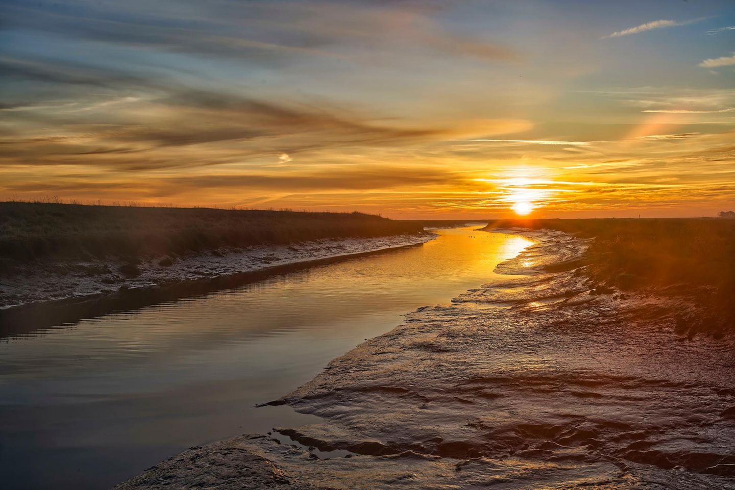 Wattenmeer mit Sonnenaufgang