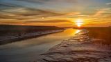 Wattenmeer mit Sonnenaufgang