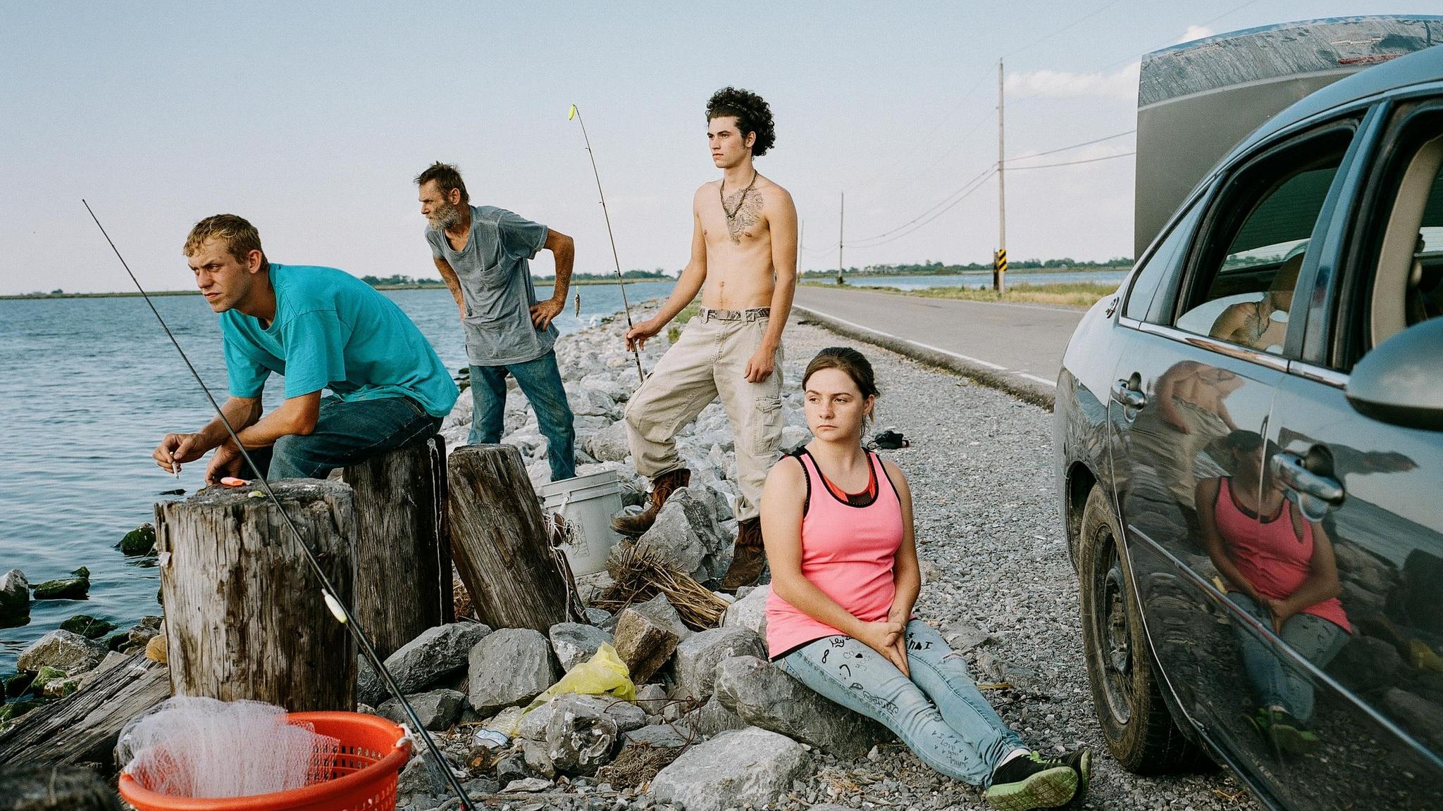 Eine Familie angelt in den Gewässern um die Isle de Jean Charles. Der Fisch, verkauft oder selbst gegessen, ist eine wichtige Ergänzung in einer Gegend, in der jeder Fünfte unter der Armutsgrenze lebt