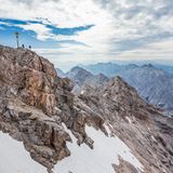 Germany, Bavaria, Bavarian Alps, Wetterstein Range, view of the Zugspitze summit cross, Germany"u2019s highest mountain at 2962 metres