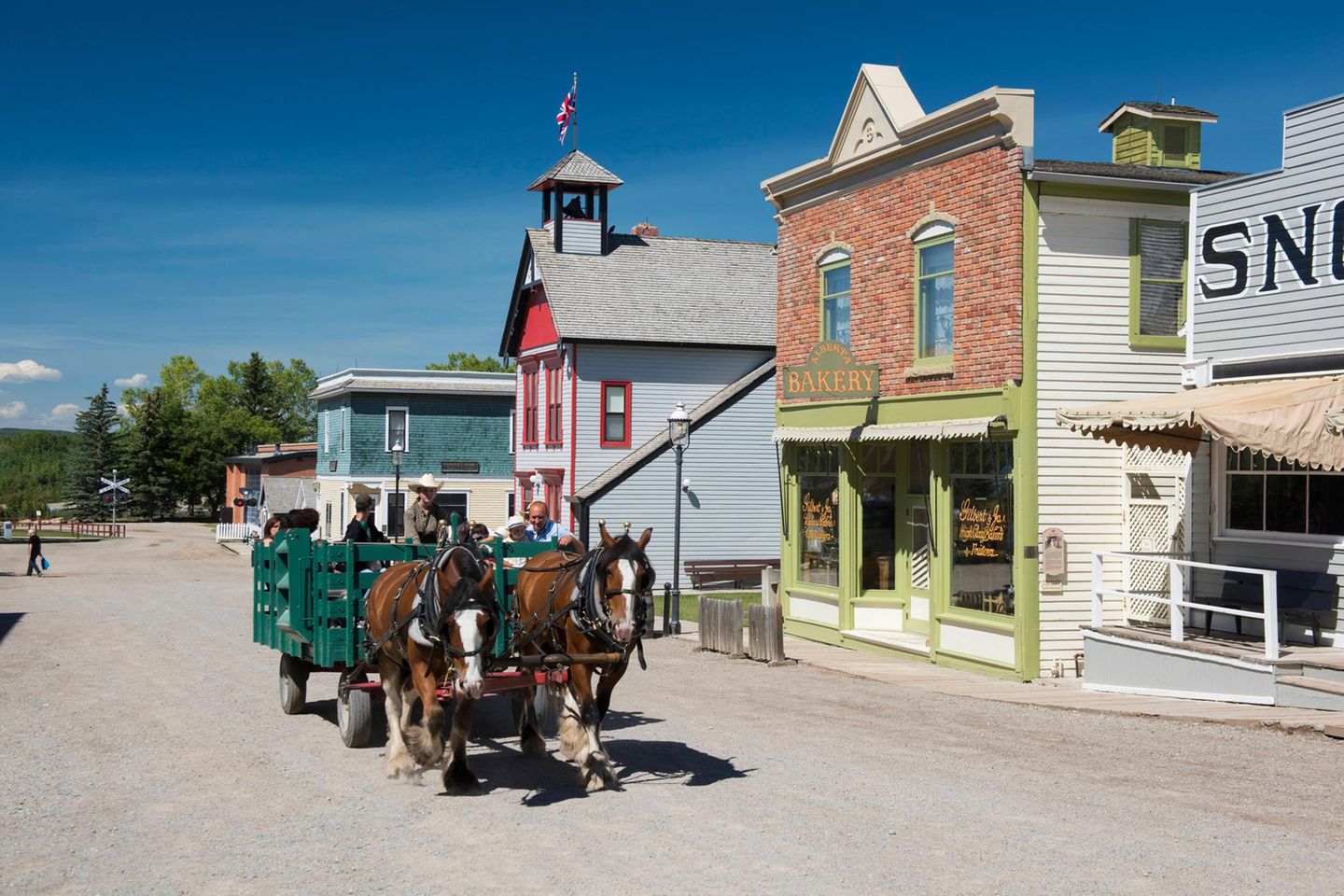 Der Heritage Park in Calgary: Geschichte zum Anfassen Menschen, die Pferde als Transportmittel nutzen