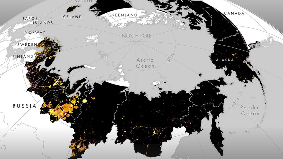 Die Karte zeigt unbeleuchtete (schwarz) und beleuchtete Gebiete (orange) mit stark zunehmender (gelb) oder abnehmender Lichtverschmutzung (violett) zwischen 1992 und 2013