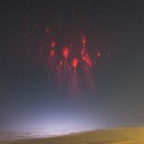 Sprites, auch Rote Kobolde genannt, über dem Nachhimmel Shanghais