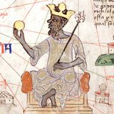 Mansa Musa hält Gold in seiner Hand