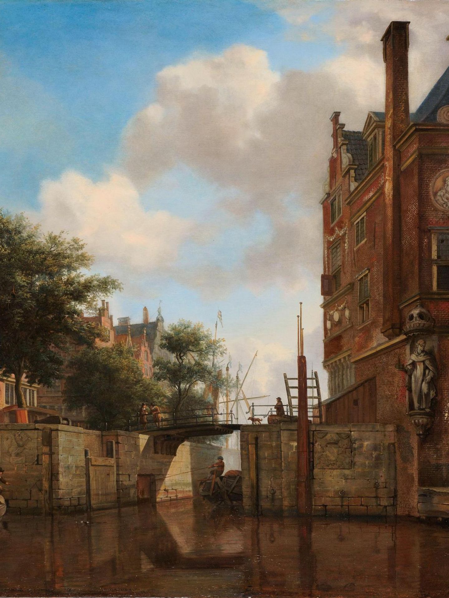 Herengracht, wo ein Kahn gerade eine Schleuse passiert