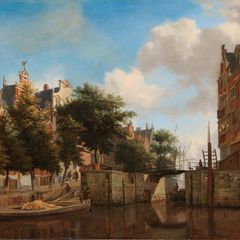 Herengracht, wo ein Kahn gerade eine Schleuse passiert