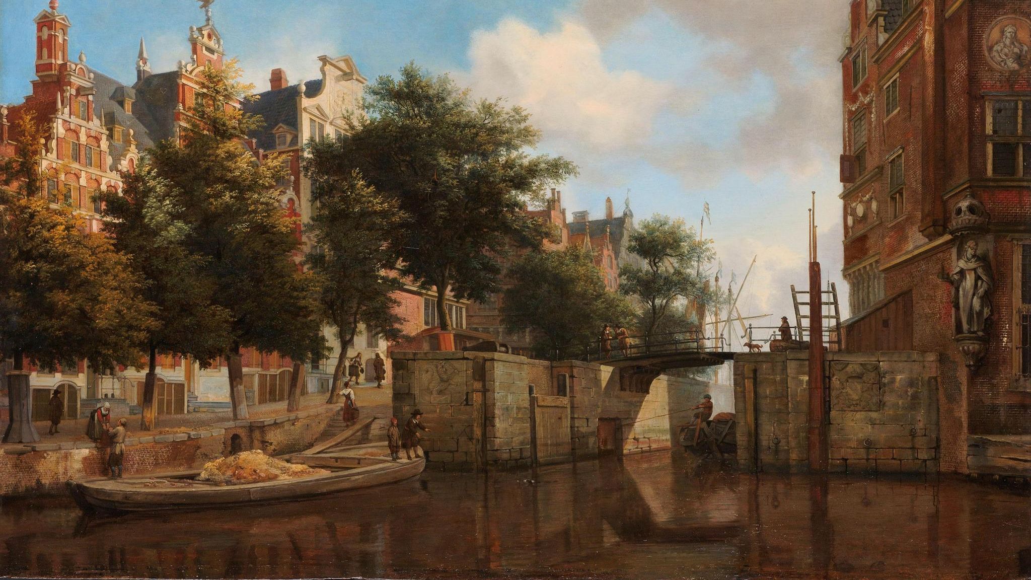 Herengracht, wo ein Kahn gerade eine Schleuse passiert