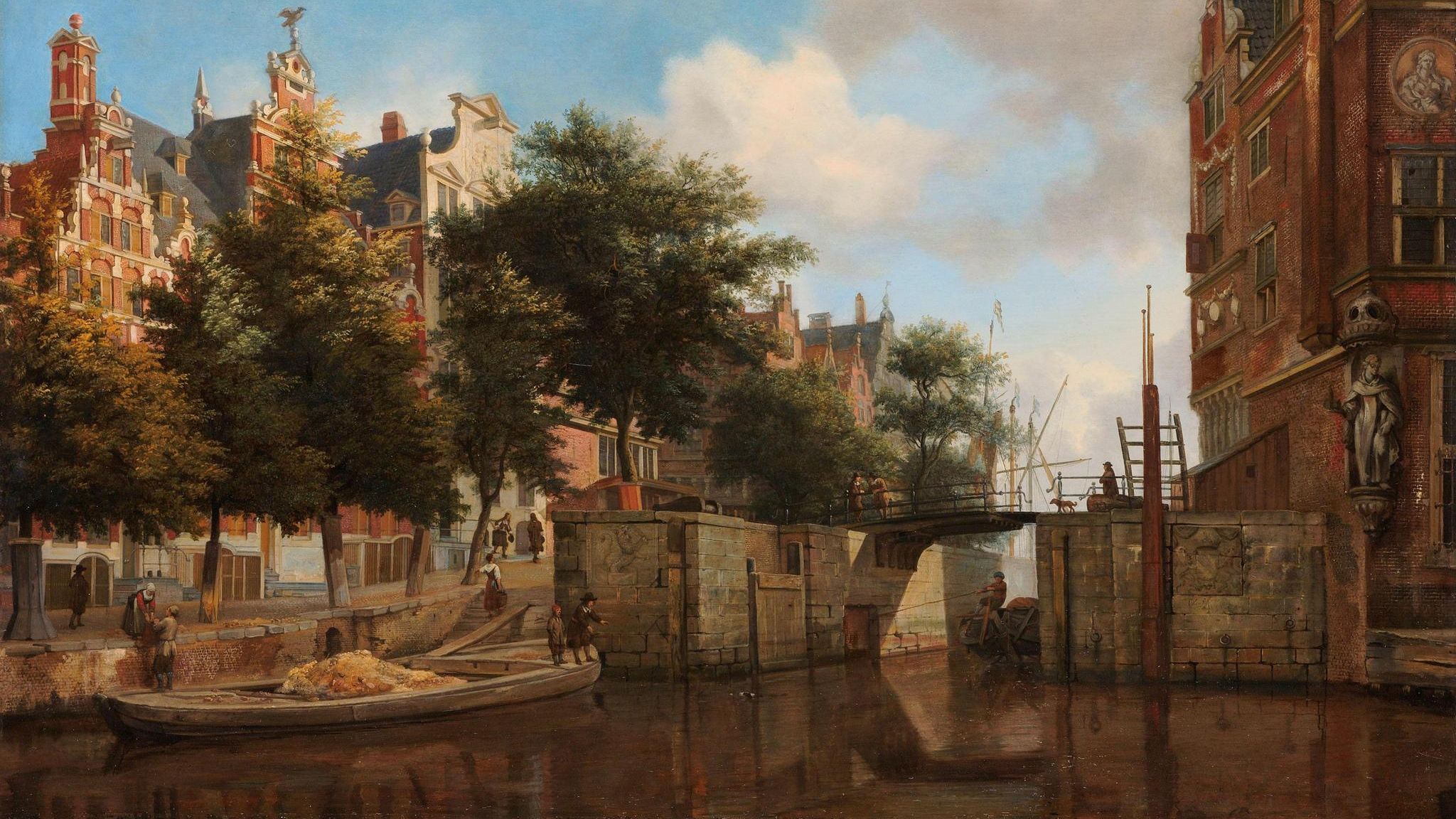 Herengracht, wo ein Kahn gerade eine Schleuse passiert