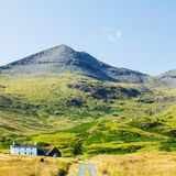 An isolated house beneath Ben More on the Isle of Mull, Scotland, UK