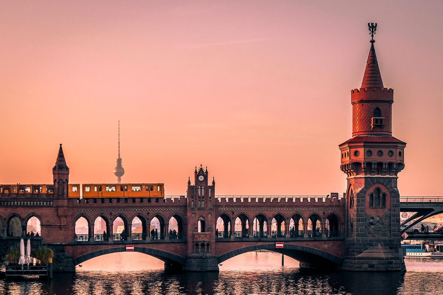 Oberbaum Bridge in Berlin at Sunset with View on the Television Tower