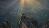 Ein Mann steht vor dem Waimea Canyon bei Sonnenaufgang, Kauai, Hawaii, Amerika, USA