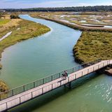 France, Vendée (85), Talmont Saint Hilaire, Guittière marshes in the hinterland of Pointe du Payré, footbridge over the Payré  Velodyssee.