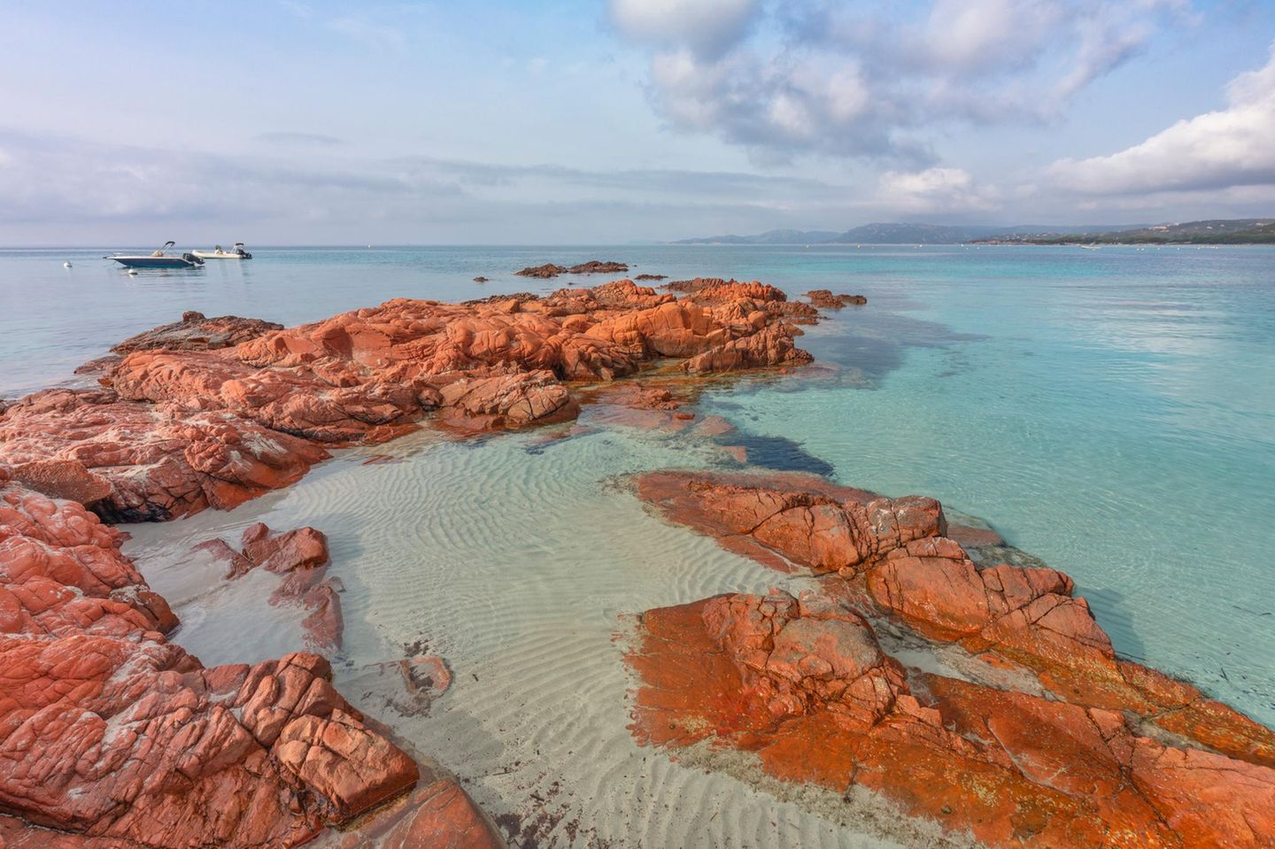 Red rock cliffs on Palombaggia beach. Porto Vecchio, Southern Corsica, France