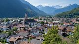 Scenic view of Mittenwald and St. Peter and Paul church in Bavaria, Germany.