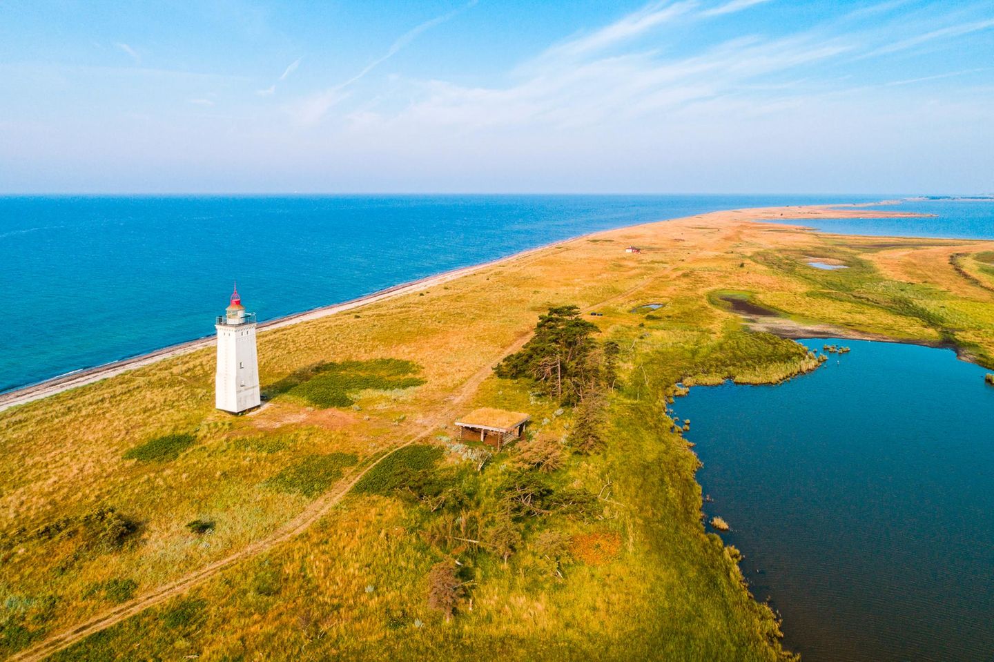 Leuchtturm Hyllekrok Fyr am Strand von Lolland