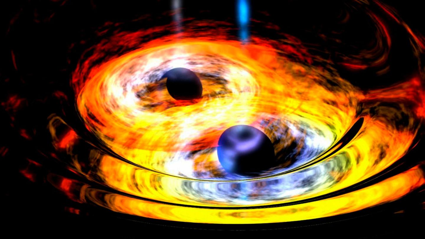 Immer enger umkreisen Schwarze Löcher einander, bis sie schließlich ineinanderfallen und zu einem noch größeren Schwarzen Loch fusionieren