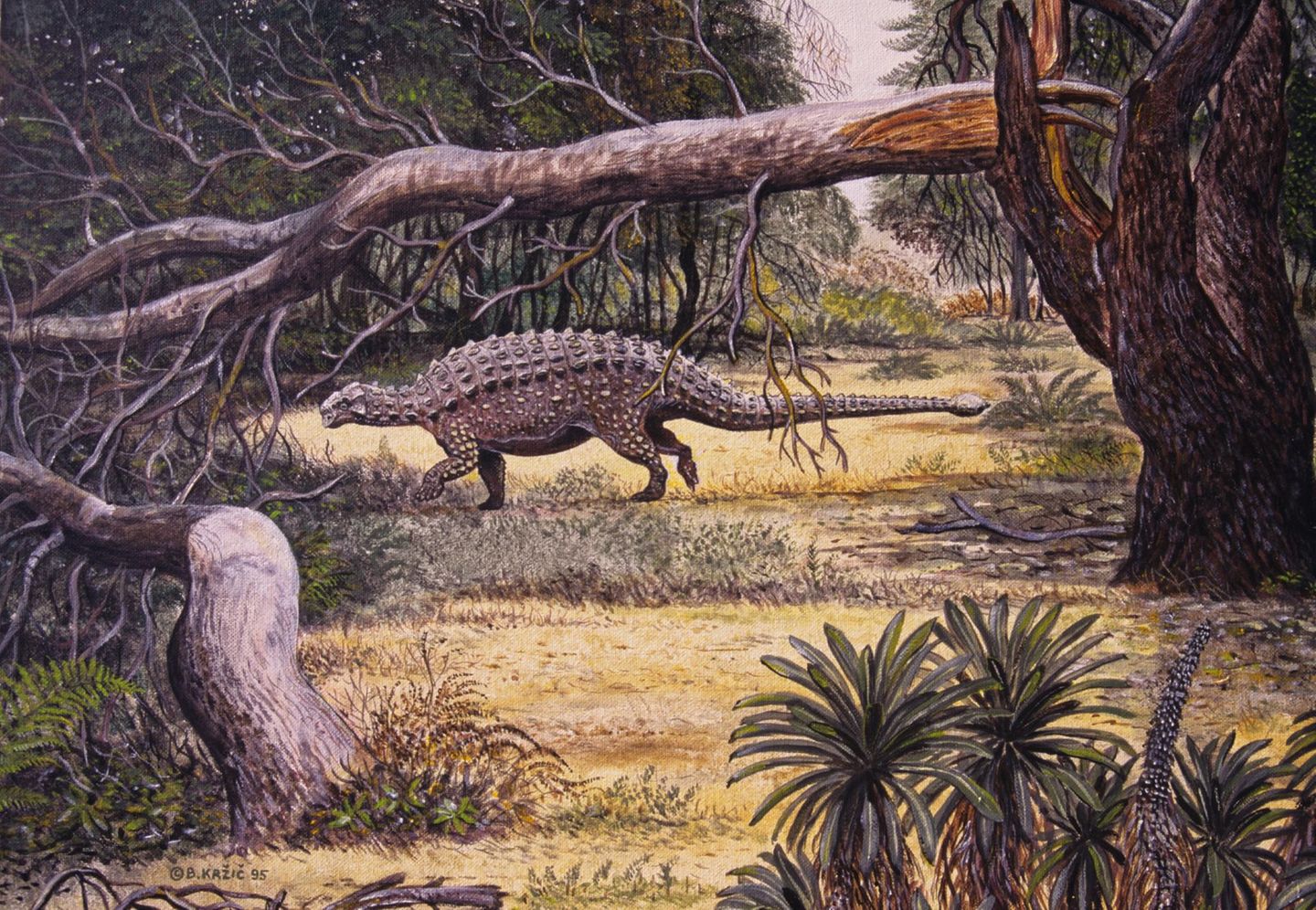 Ein Pinacosaurus unter einem umgefallenen, abgebrochenen Baumstamm