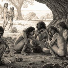 Homo antecessor verspeist einen Artgenossen. Sie sitzen in einer Höhle