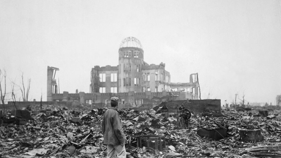 The wrecked framework of the Museum of Science and Industry in Hiroshima as it appeared shortly after the blast. City officials recently decided to preserve this building as a memorial though they had at first planned to rebuild it.
