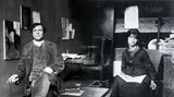 Amedeo Modigliani and Jeanne Hebuterne sitzen in einem Zimmer