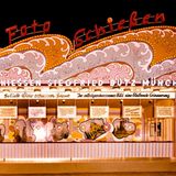 Ein rosa-orangener Schießstand