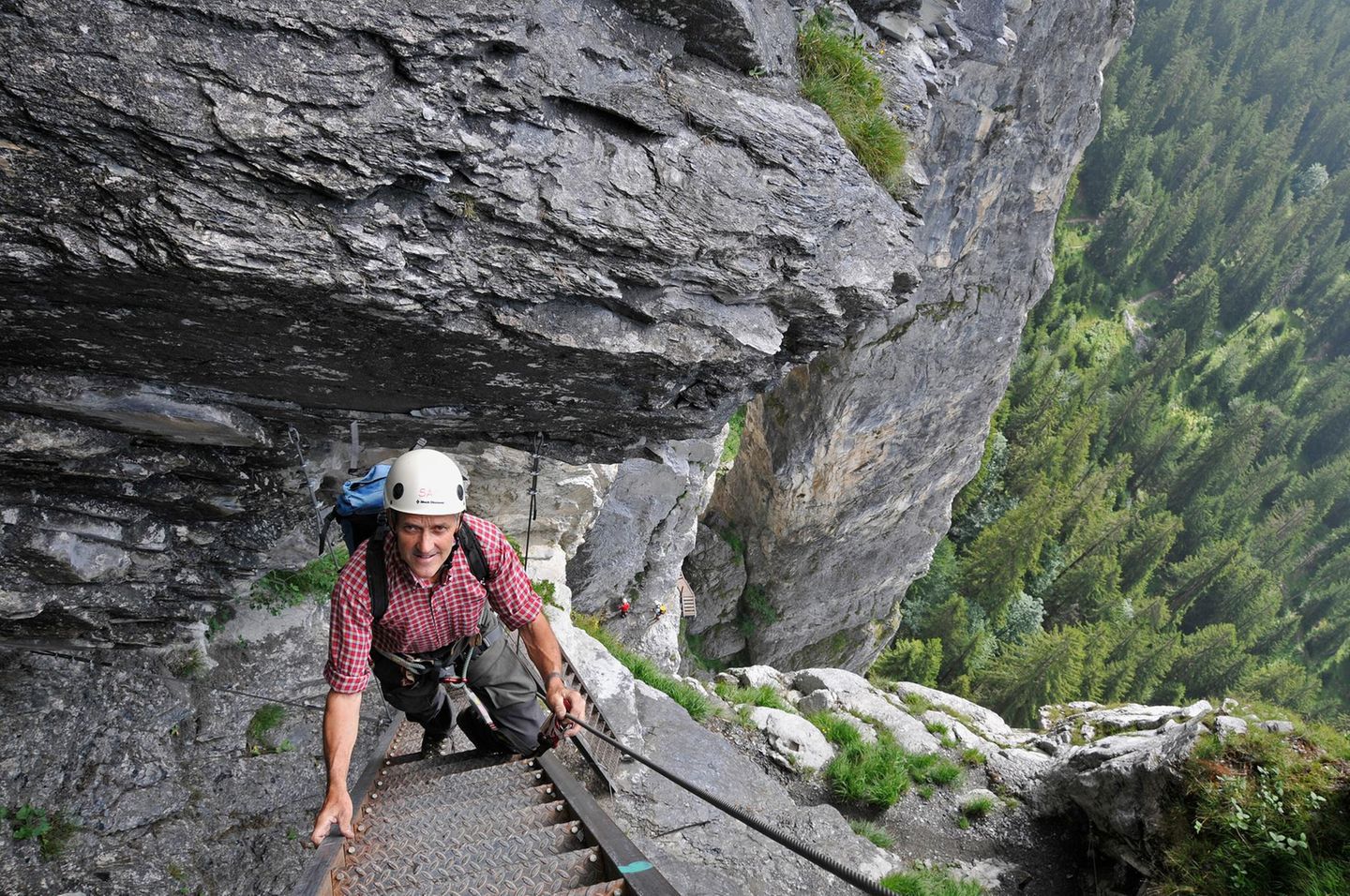 Kletterer auf dem Klettersteig Pinut