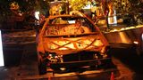 Eine verrostete Auto-Karosserie in der Nova-Ausstellung