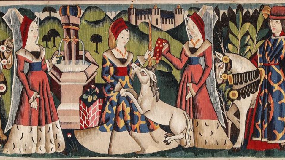 Ein Wandteppich, der eine mittelalterliche Jagdszene mit Einhorn zeigt