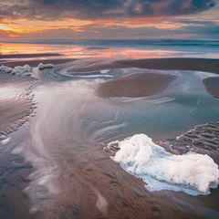 Sunset over beach at North sea coast,GR Noordwijk,Netherlands