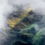 Dunst, Wellen und gespiegelter Himmel von oben