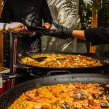 Chef cooking a seafood paella, Lima