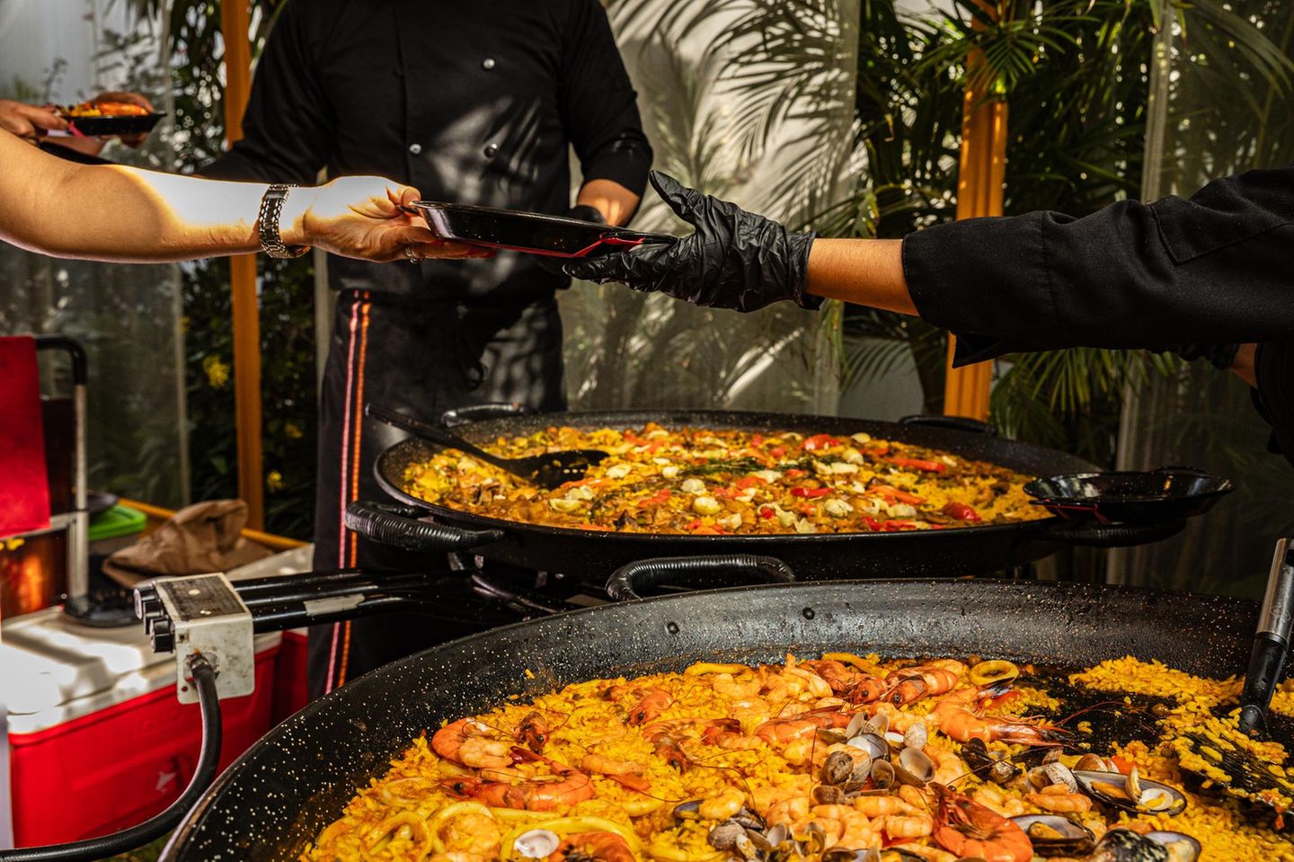 Chef cooking a seafood paella, Lima