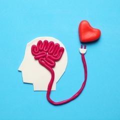 Grafik zeigt Gehirn, das mit einem Herzen verbunden ist