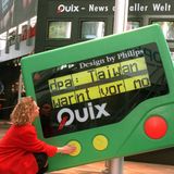 Eine Frau vor einem großen, grünen Pager 1996 auf der Cebit