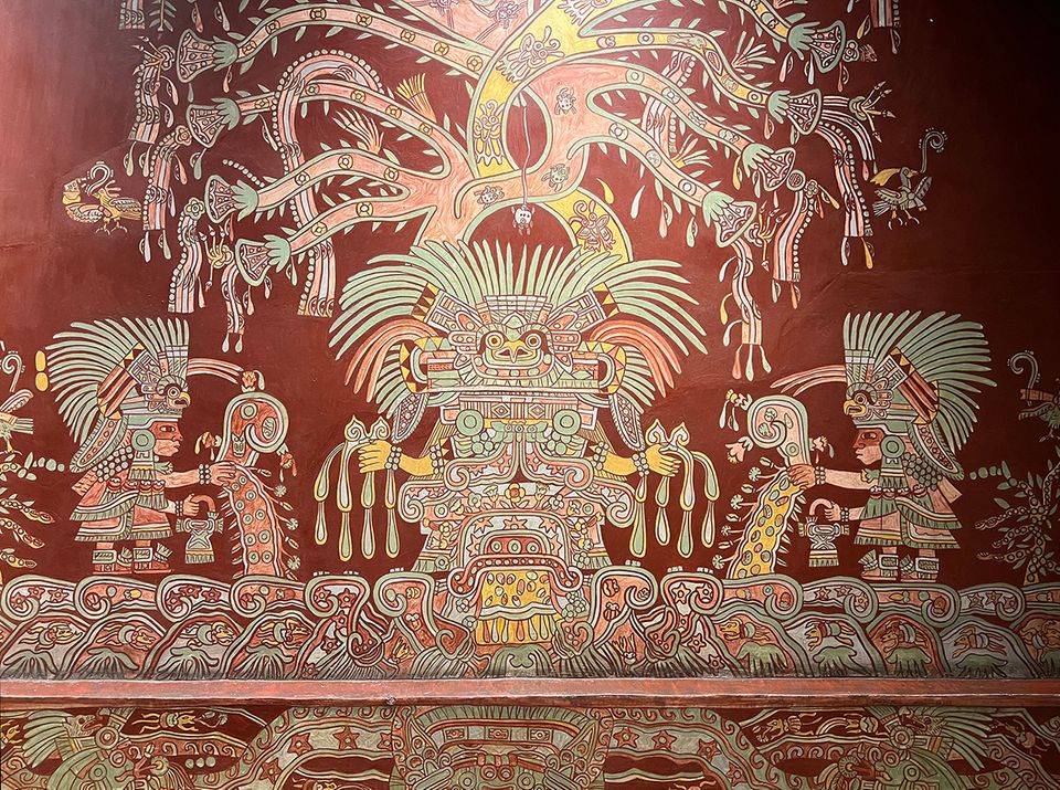 mesoamerikanische Wandmalerei: zwei Menschen opfern einer Gottheit