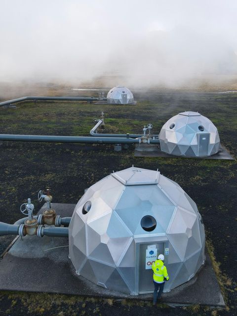 Caption/Abstract=Carbfix domes are seen at the Hellisheidi power plant near Reykjavik on October 11, 2021. At the base of an Icelandic volcano, the newly-opened plant is sucking carbon dioxide from the air and turning it to rock, locking away the main culprit behind global warming. (Photo by Halldor KOLBEINS / AFP)