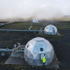 Caption/Abstract=Carbfix domes are seen at the Hellisheidi power plant near Reykjavik on October 11, 2021. At the base of an Icelandic volcano, the newly-opened plant is sucking carbon dioxide from the air and turning it to rock, locking away the main culprit behind global warming. (Photo by Halldor KOLBEINS / AFP)
