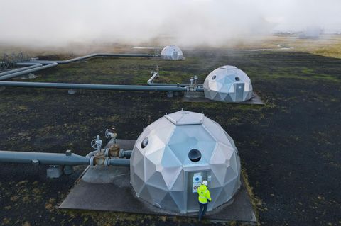 Caption/Abstract=Carbfix domes are seen at the Hellisheidi power plant near Reykjavik on October 11, 2021. At the base of an Icelandic volcano, the newly-opened plant is sucking carbon dioxide from the air and turning it to rock, locking away the main culprit behind global warming. (Photo by Halldor KOLBEINS / AFP)